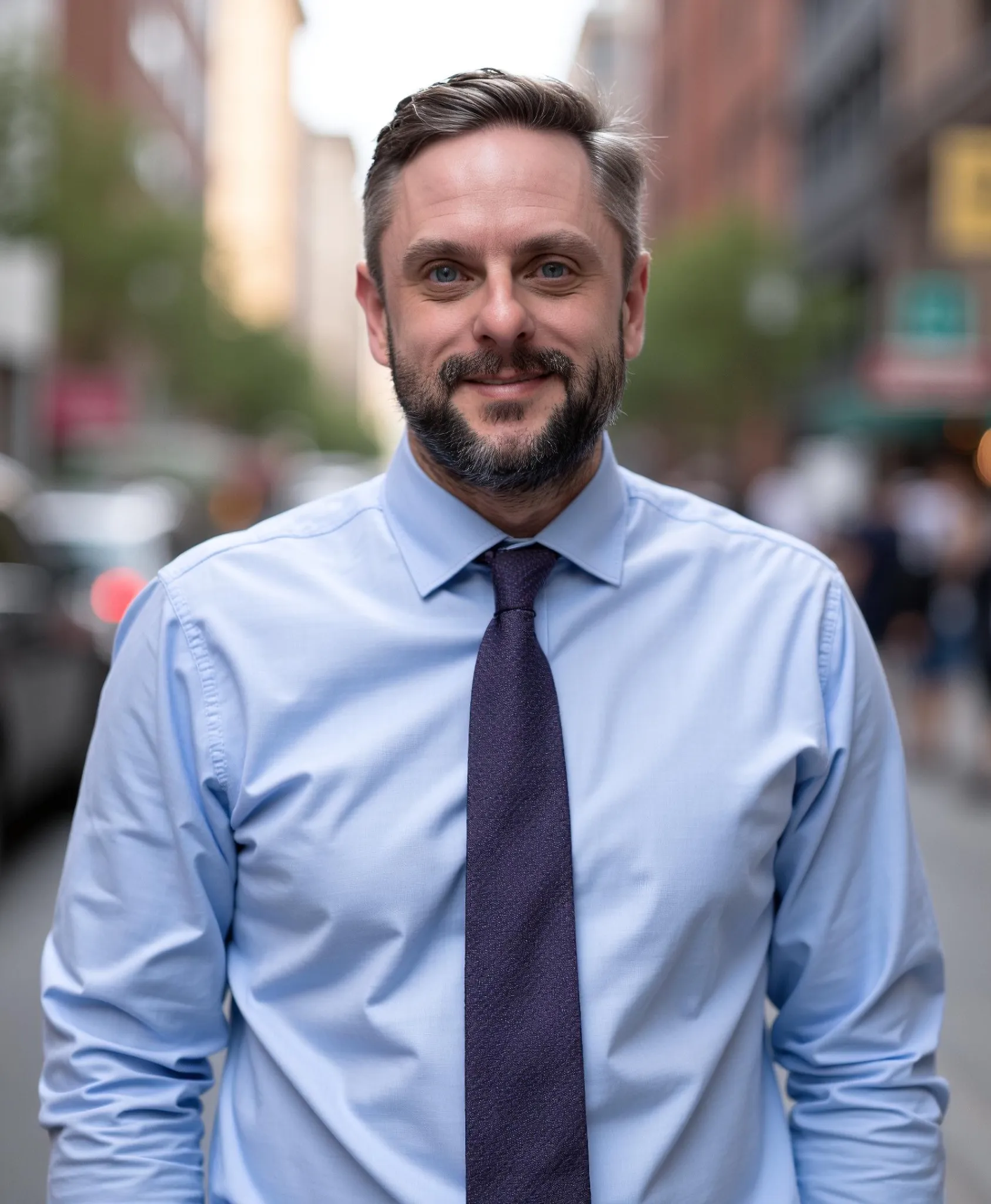 Chris Ritchhart in a blue shirt and tie